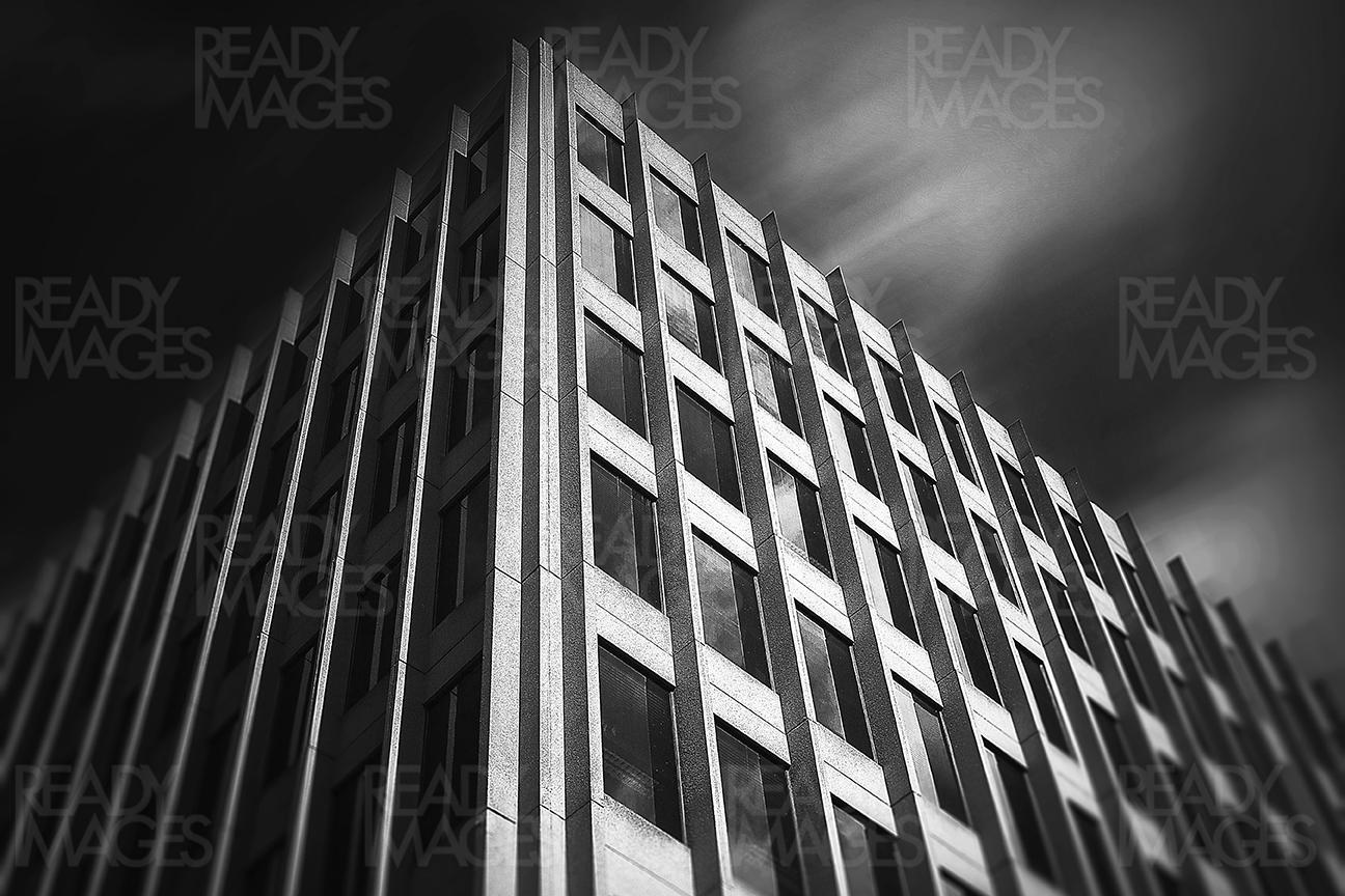 Fine art black and white low angle image, looking up at the tall building in Melbourne