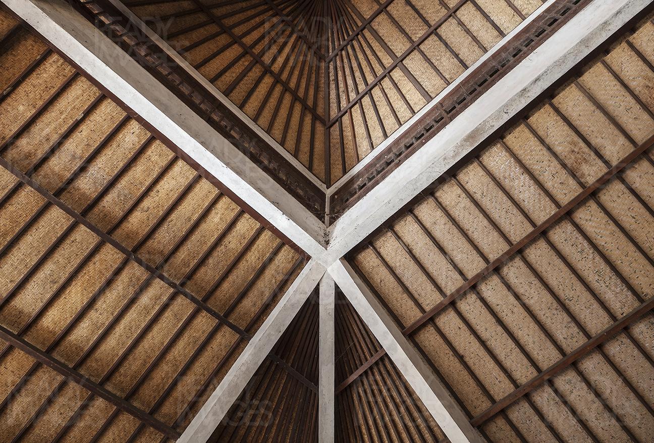 View from down, looking up at the traditional Balinese roof detail built almost entirely of organic and local materials