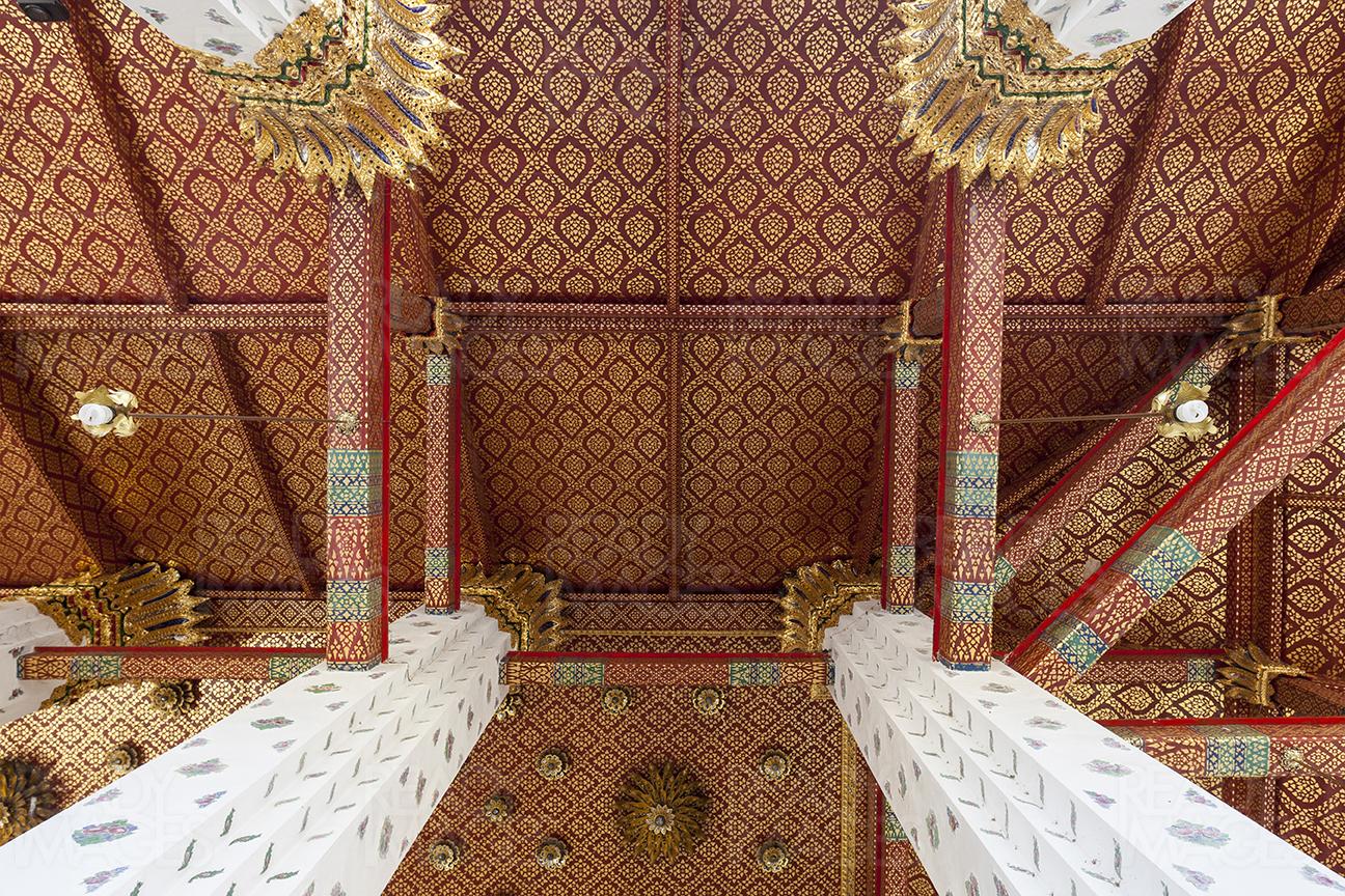 View from down, looking up at the ornamental roof detail of Wat Phra Kaew, the Temple of the Emerald Buddha in Bangkok, Thailand