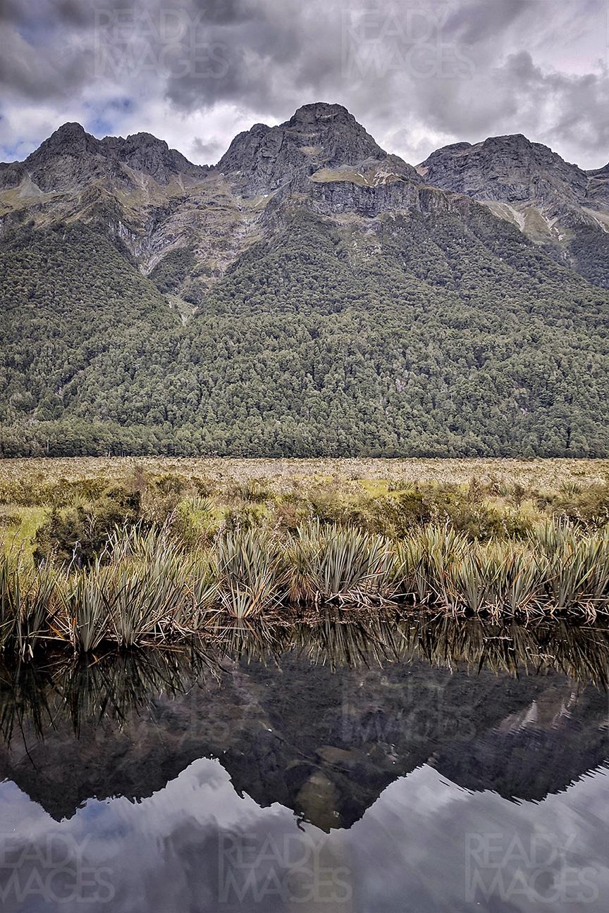 The image of the Mirror-Lake, famous for a clear and mirror-like reflection, located in Fiordland National Park, New Zealand
