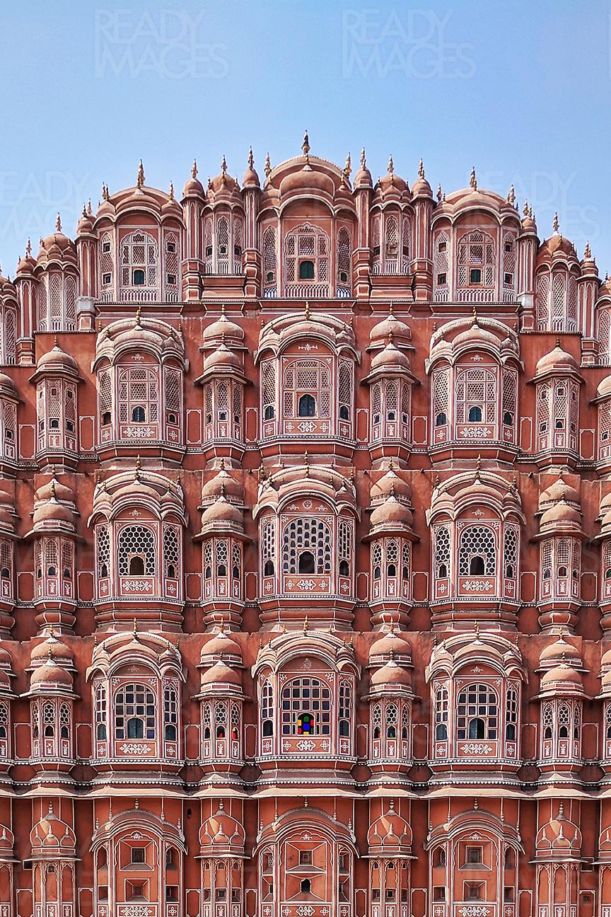 Image of Hawa Mahal (Palace of the Winds) on a clear blue sky - Jaipur, India