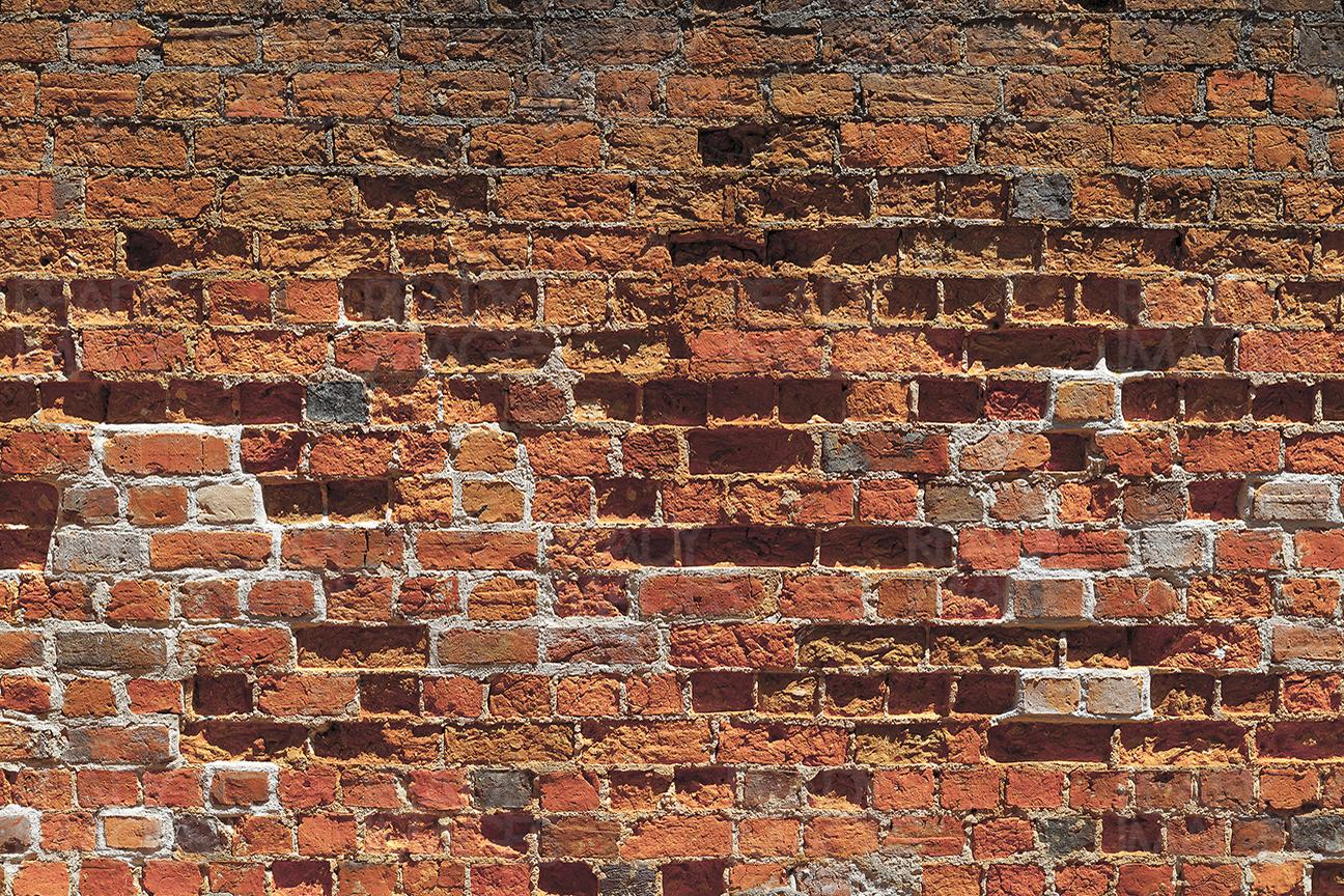 Image of an old damaged brick wall