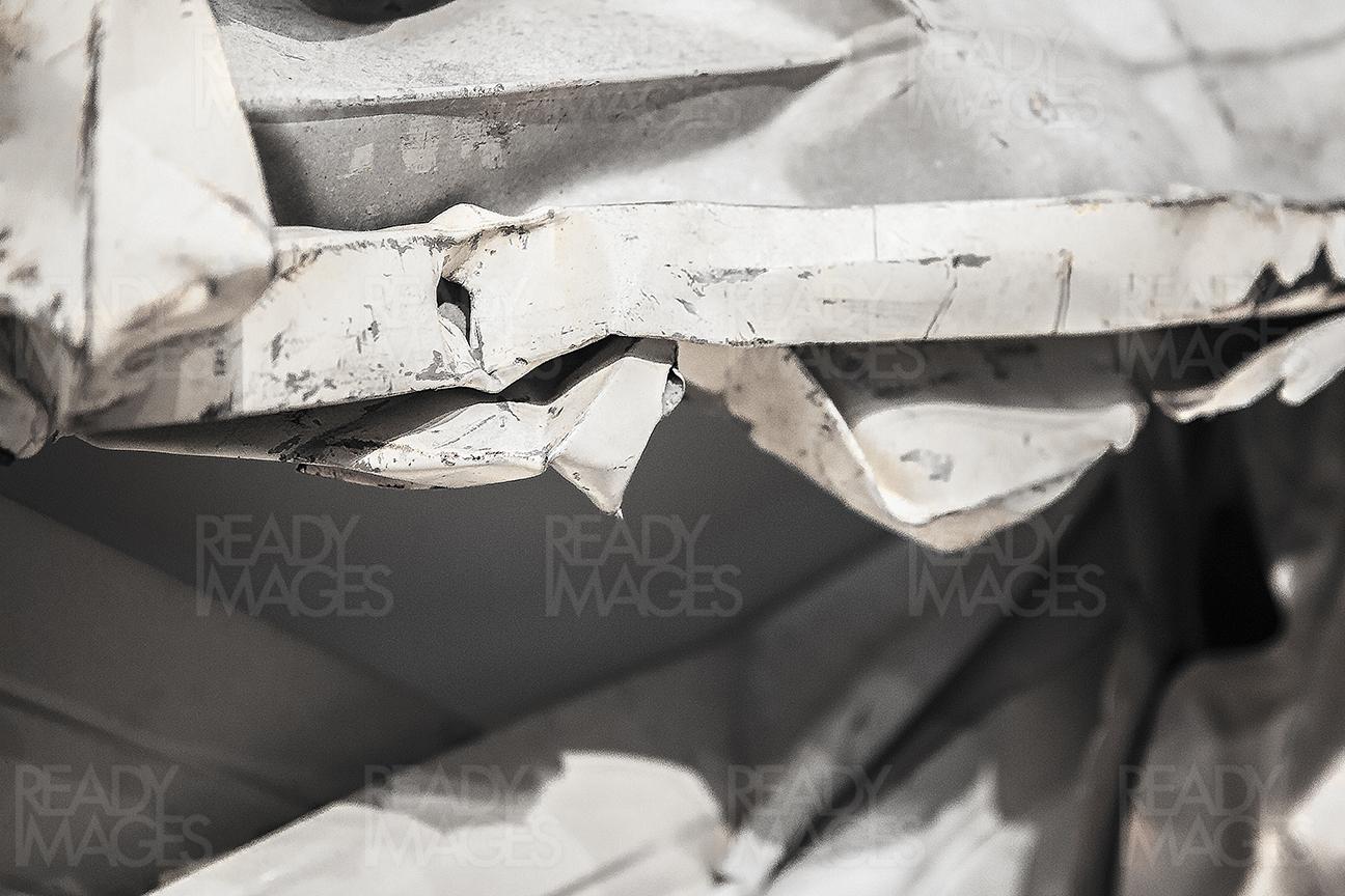 Abstract image of the rustic damaged corrugated metal sheet