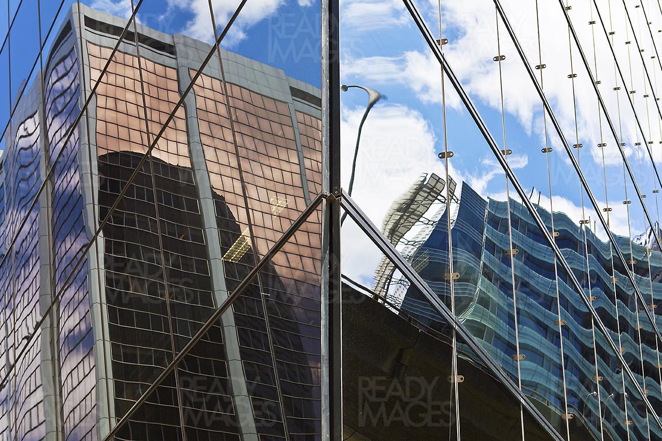 Abstract image of a mirror-like reflective facade of a skyscraper in Sydney CBD