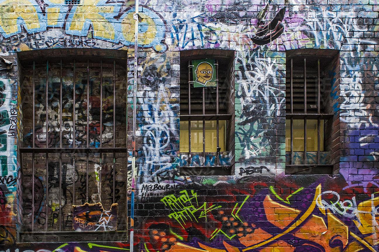 Hosier Lane of Melbourne filled with graffiti all around. Includes graffiti by some of the very famous artists