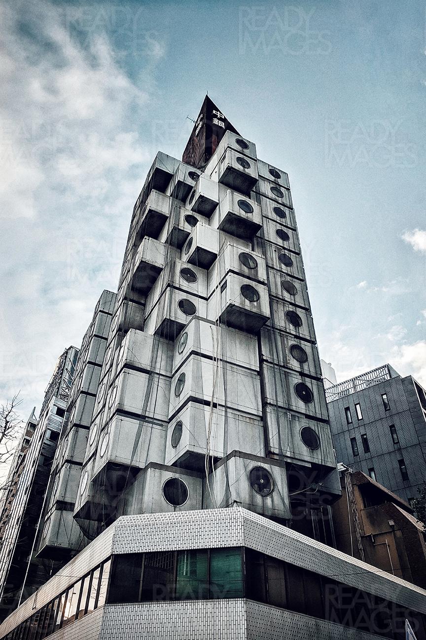 Nakagin Capsule Tower designed by architect Kisho Kurokawa and located in Shimbashi, Tokyo, Japan